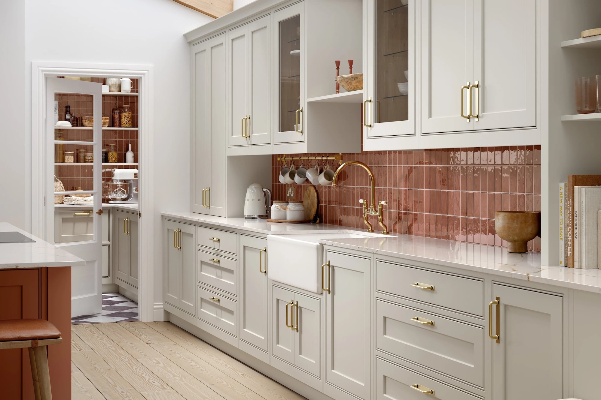 Modern kitchen with white cabinets, marble countertop, and tiled backsplash.